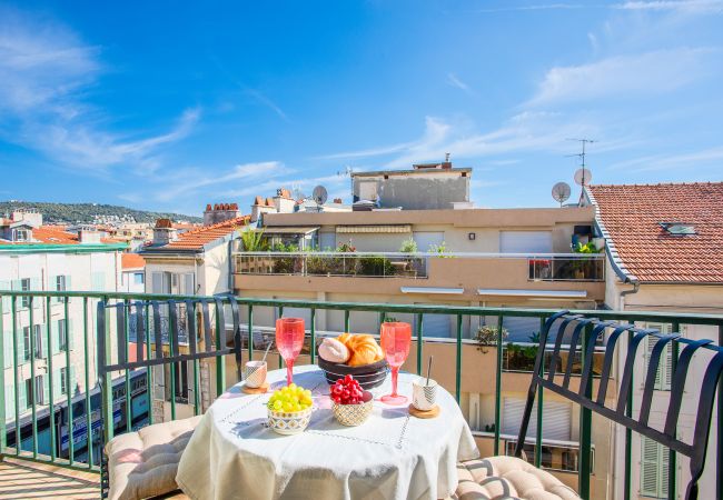 Balcony with table and chairs